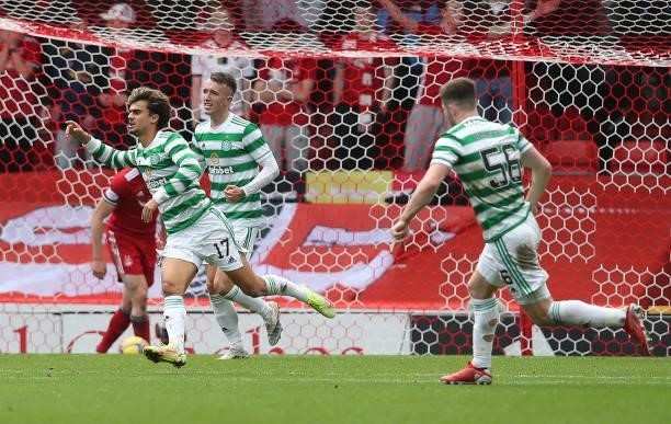 Jota of Celtic celebrates after scoring his team's second goal during the Ladbrokes Scottish Premiership match between Aberdeen and Celtic at...