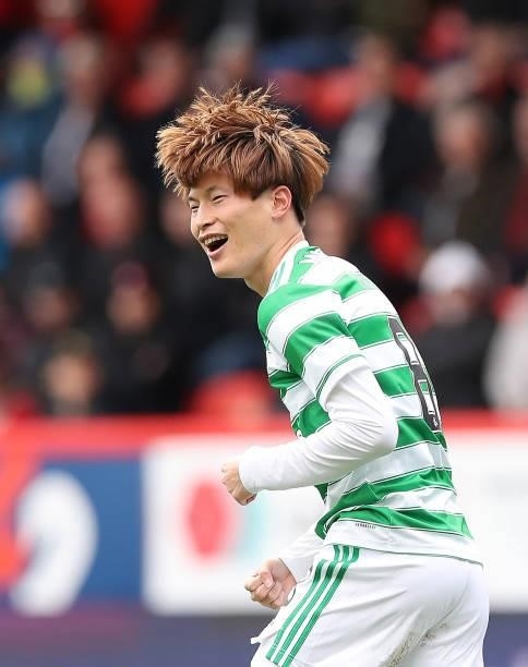 Kyogo Furuhashi of Celtic celebrates after scoring the opening goal during the Ladbrokes Scottish Premiership match between Aberdeen and Celtic at...