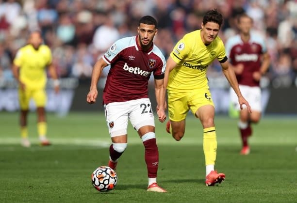 Said Benrahma of West Ham United with Christian Norgaard of Brentford during the Premier League match between West Ham United and Brentford at London...