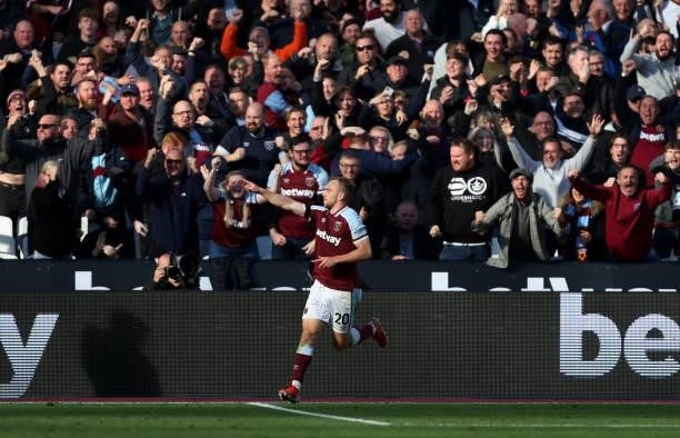Jarrod Bowen of West Ham United celebrates after scoring his team's first goal during the Premier League match between West Ham United and Brentford...