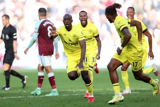 Yoane Wissa of Brentford celebrates after scoring his team's second goal during the Premier League match between West Ham United and Brentford at...