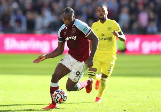 Michail Antonio of West Ham United controls the ball during the Premier League match between West Ham United and Brentford at London Stadium on...