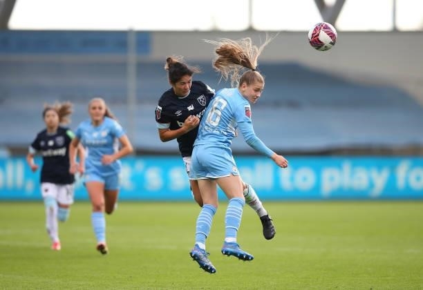 Jess Park of Manchester City Women is challenged by Zaneta Wyne of West Ham United Women during the Barclays FA Women's Super League match between...