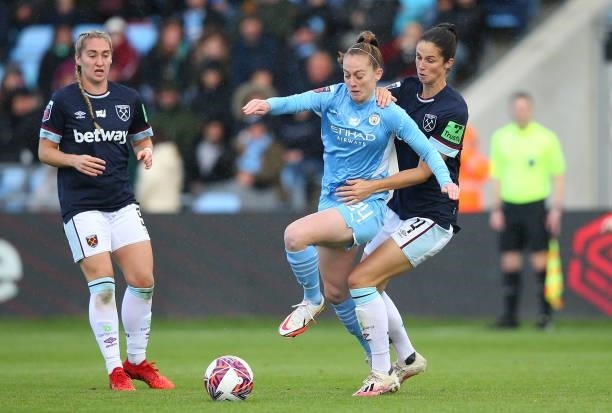 Keira Walsh of Manchester City Women beats Abbey-Leigh Stringer of West Ham United Women during the Barclays FA Women's Super League match between...