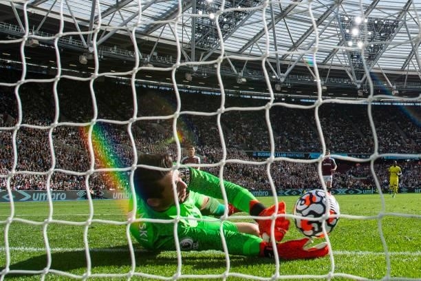 Lukasz Fabianski of West Ham United fails to stop the ball crossing the line the opening goal of the game scored by Bryan Mbeumo of Brentford during...