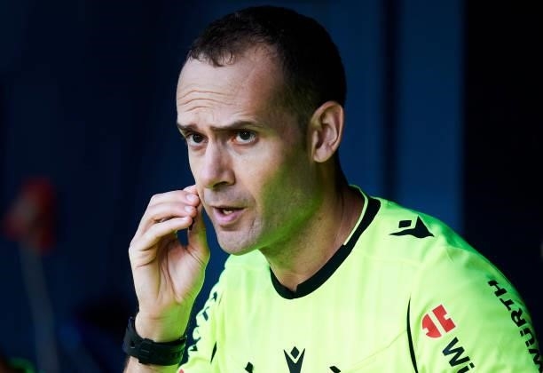 Spanish referee Mario Melero Lopez reacts during the La Liga Santander match between CA Osasuna and Rayo Vallecano at Estadio El Sadar on October 02,...