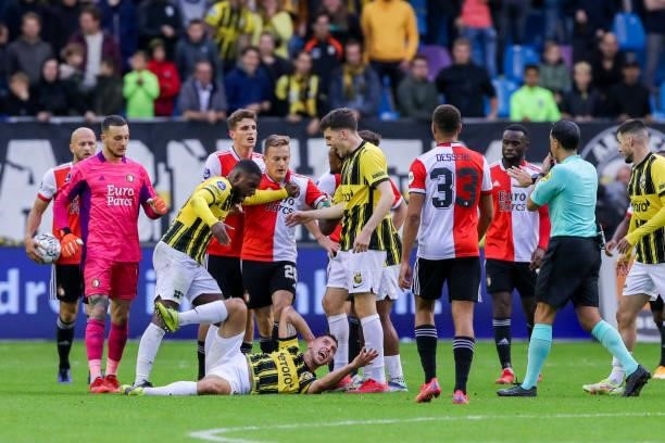 Injury by Maximilian Wittek of Vitesse, with Justin Bijlow of Feyenoord, Cyriel Dessers of Feyenoord, Lois Openda of Vitesse during the Dutch...