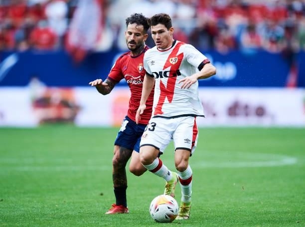 Ruben Garcia of CA Osasuna duels for the ball with Fran Garcia of Rayo Vallecano during the La Liga Santander match between CA Osasuna and Rayo...