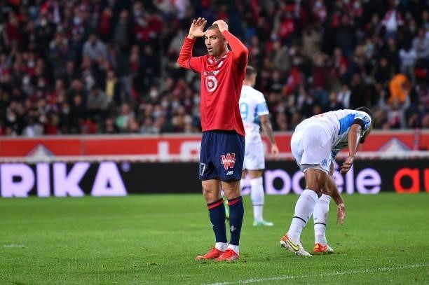 Burak Yilmaz of Lille OSC reacts during the Ligue 1 Uber Eats match between Lille and Marseille at Stade Pierre Mauroy on October 03, 2021 in Lille,...