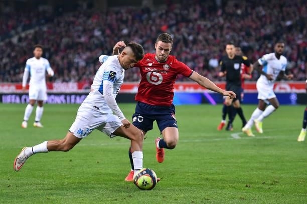 Cengiz Under of Olympique de Marseille kicks the ball during the Ligue 1 Uber Eats match between Lille and Marseille at Stade Pierre Mauroy on...