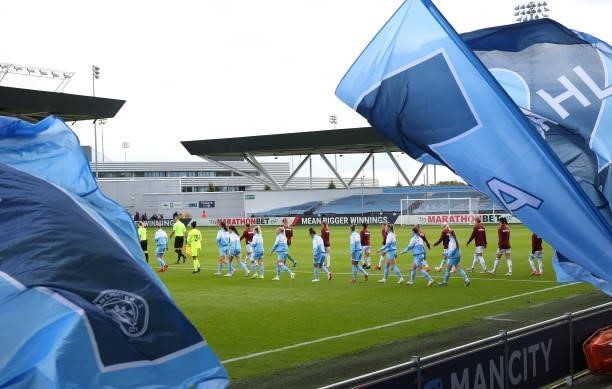 The players of Manchester City Women and West Ham United Women walk out for the Barclays FA Women's Super League match between Manchester City Women...