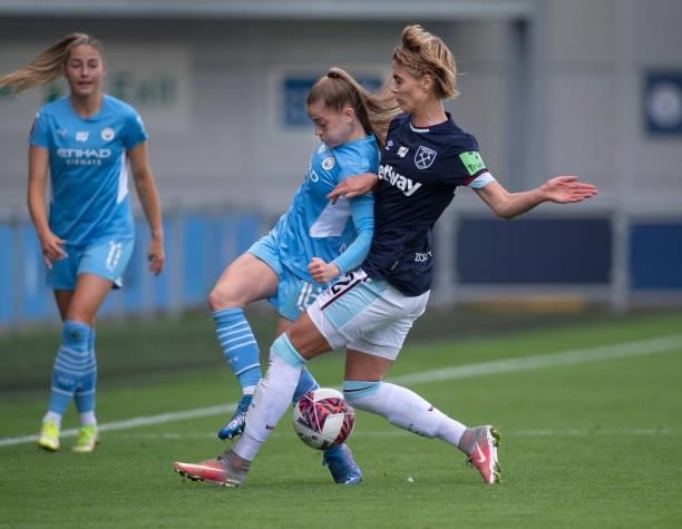 Jess Park of Manchester City and Dagny Brynjarsdottir of West Ham United in action during the Barclays FA Women's Super League match between...