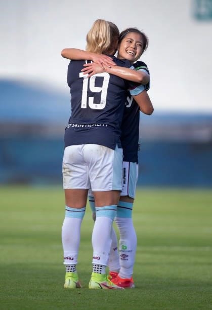Yui Hasegawa of West Ham United celebrates scoring their team's second goal with team mate Adriana Leon during the Barclays FA Women's Super League...