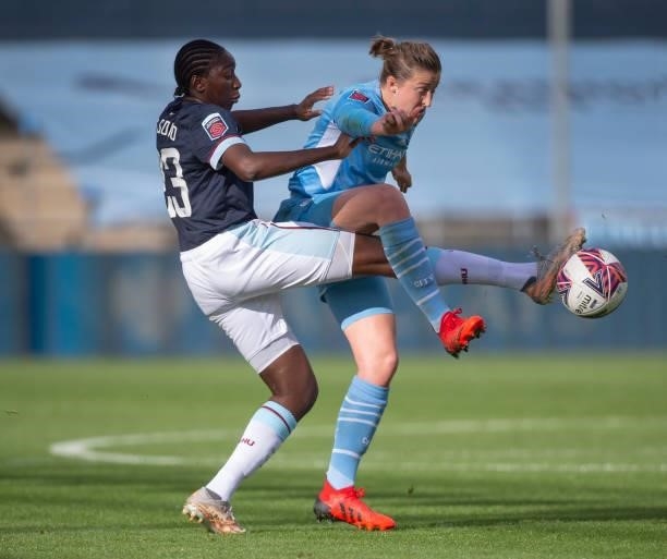 Ellen White of Manchester City and Hawa Cissoko of West Ham United in action during the Barclays FA Women's Super League match between Manchester...