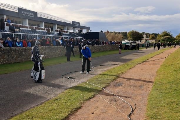 Matthieu Pavon of France plays his third shot on the 17th hole during the final round of The Alfred Dunhill Links Championship on The Old Course on...