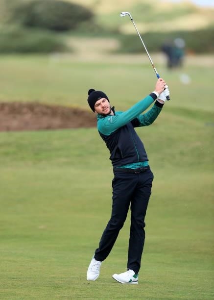 Laurie Canter of England plays his second shot on the 15th hole during the final round of The Alfred Dunhill Links Championship on The Old Course on...