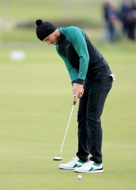 Laurie Canter of England putts on the 16th hole during the final round of The Alfred Dunhill Links Championship on The Old Course on October 03, 2021...