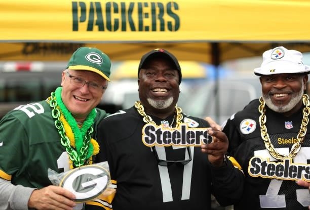 Green Bay Packers and Pittsburgh Steelers fans tailgate in the parking lot before the game at Lambeau Field on October 03, 2021 in Green Bay,...