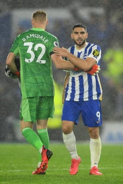 Aaron Ramsdale of Arsenal and Neal Maupay of Brighton & Hove Albion embrace at the end of the Premier League match between Brighton & Hove Albion and...