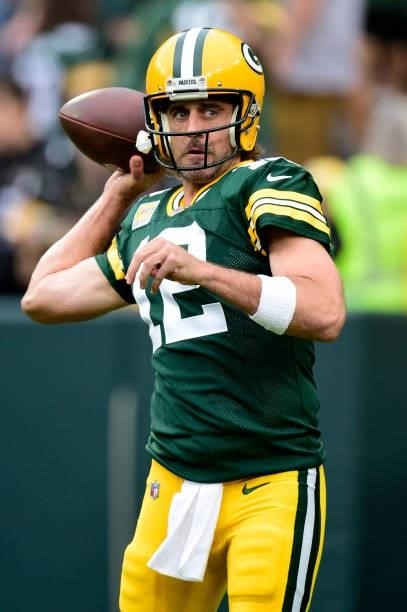 Aaron Rodgers of the Green Bay Packers throws the ball during pregame against the Pittsburgh Steelers at Lambeau Field on October 03, 2021 in Green...