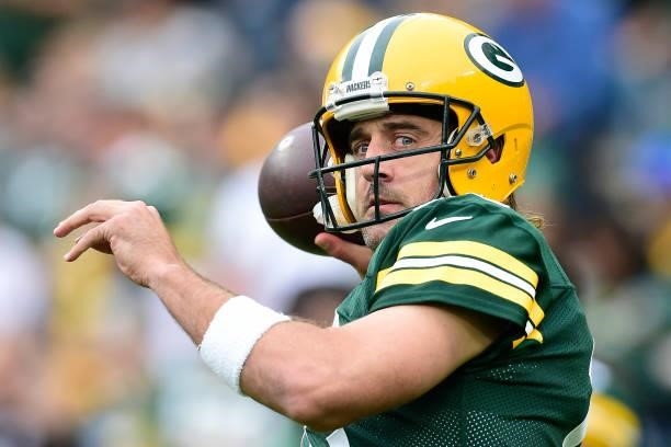 Aaron Rodgers of the Green Bay Packers throws the ball during pregame against the Pittsburgh Steelers at Lambeau Field on October 03, 2021 in Green...