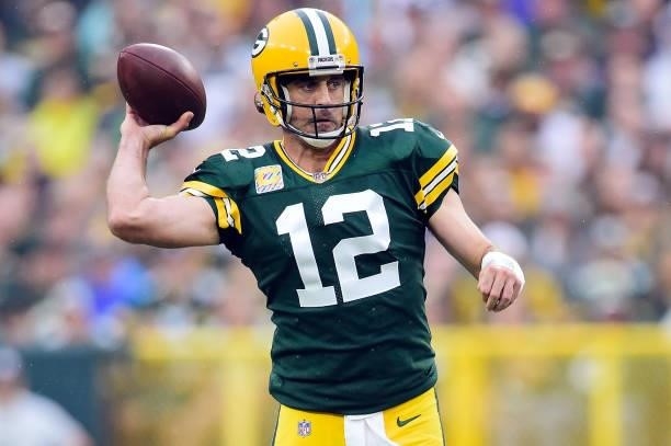 Aaron Rodgers of the Green Bay Packers looks to throw the ball during the first quarter against the Seattle Seahawks at Lambeau Field on October 03,...