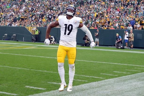JuJu Smith-Schuster of the Pittsburgh Steelers celebrates after a touchdown by Diontae Johnson during the first quarter against the Green Bay Packers...