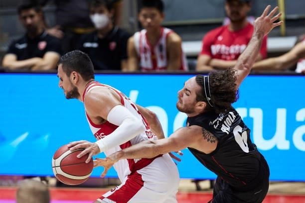Alessandro Pajola of Virtus Segafredo Bologna competes for the ball with Alessandro Gentile of Openjobmetis Varese during the Lega Basket Serie A...