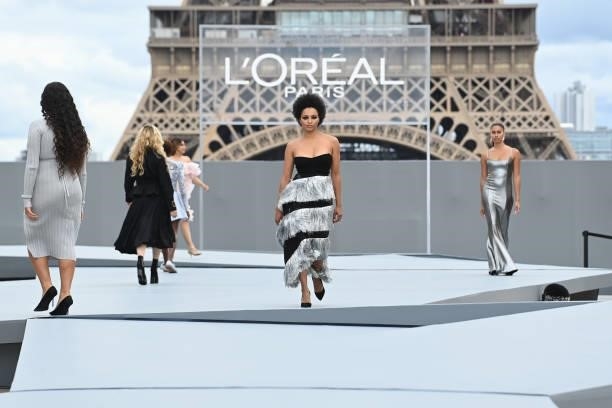 Kat Graham walks the runway during "Le Defile L'Oreal Paris 2021