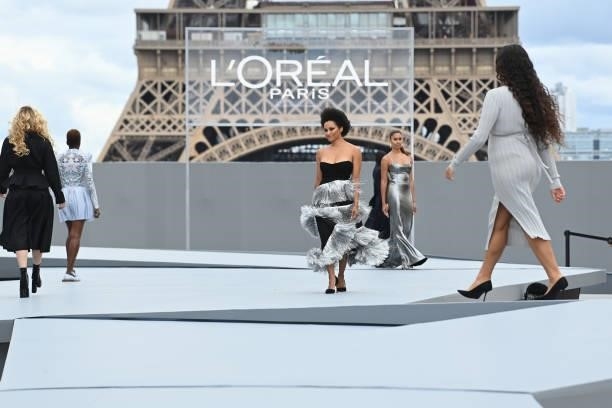 Kat Graham walks the runway during "Le Defile L'Oreal Paris 2021