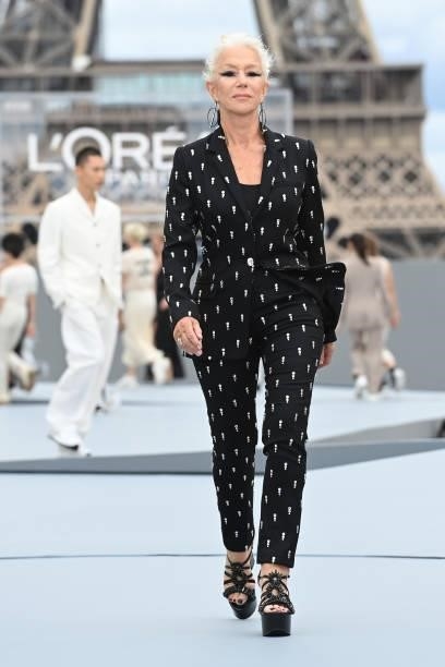 Dame Helen Mirren walks the runway during "Le Defile L'Oreal Paris 2021