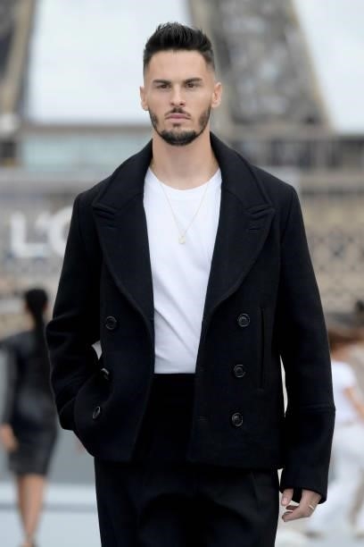 Baptiste Giabiconi walks the runway during "Le Defile L'Oreal Paris 2021