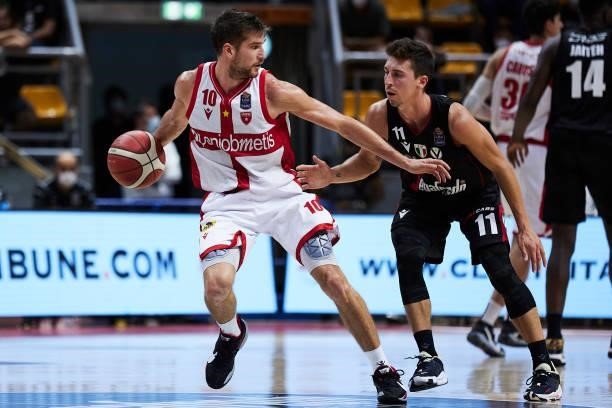 Giovanni De Nicolao of Openjobmetis Varese competes for the ball with Michele Ruzzier of Virtus Segafredo Bologna during the Lega Basket Serie A...