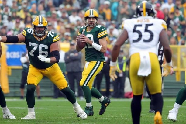Aaron Rodgers of the Green Bay Packers looks to throw the ball during the first quarter against the Pittsburgh Steelers at Lambeau Field on October...