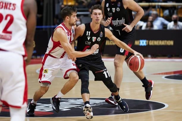 Michele Ruzzier of Virtus Segafredo Bologna competes for the ball with Giovanni De Nicolao of Openjobmetis Varese during the Lega Basket Serie A...