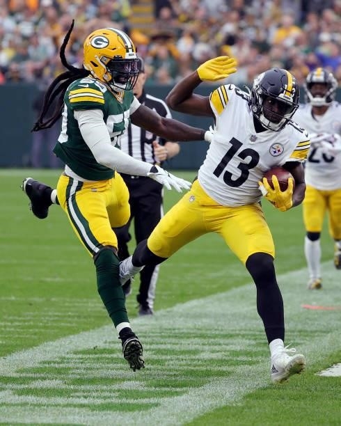 James Washington of the Pittsburgh Steelers is pushed out of bounds by De'Vondre Campbell of the Green Bay Packers during the second quarter at...