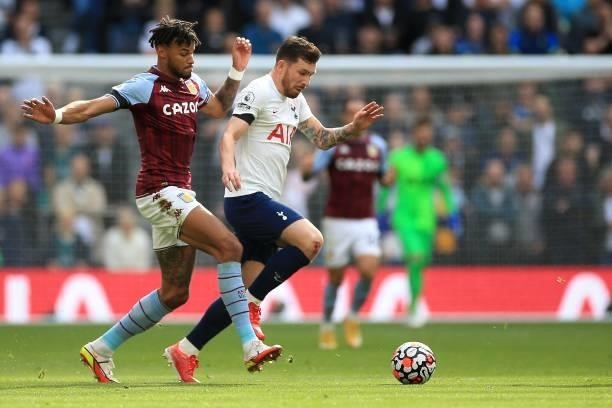 Pierre-Emile Hojbjerg of Tottenham Hotspur and Tyrone Mings of Aston Villa during the Premier League match between Tottenham Hotspur and Aston Villa...