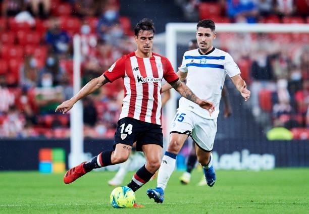 Toni Moya of Deportivo Alaves duels for the ball with Dani Garcia of Athletic Club during the Laliga Santander match between Athletic Club and...