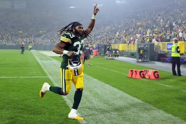 Aaron Jones of the Green Bay Packers celebrates after defeating the Pittsburgh Steelers 27-17 at Lambeau Field on October 03, 2021 in Green Bay,...