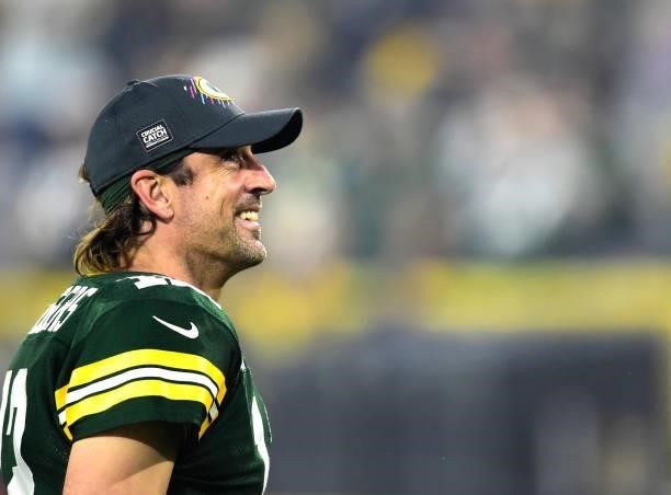 Aaron Rodgers of the Green Bay Packers walks off the field after defeating the Pittsburgh Steelers 27-17 at Lambeau Field on October 03, 2021 in...
