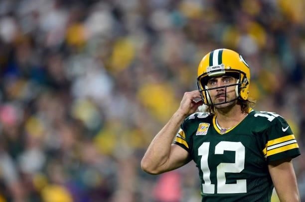 Aaron Rodgers of the Green Bay Packers walks back to the bench after and incomplete pass during the fourth quarter against the Pittsburgh Steelers at...