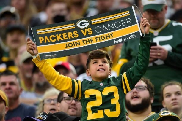 Green Bay Packers fan cheers for Packers vs Cancer between the third and fourth quarter against the Pittsburgh Steelers at Lambeau Field on October...