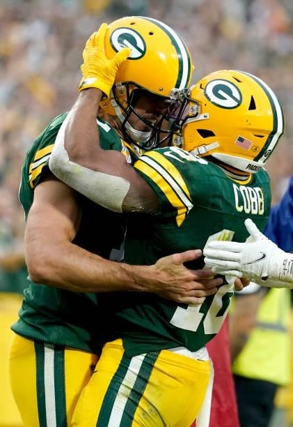 Aaron Rodgers and Randall Cobb of the Green Bay Packers celebrate a touchdown during the fourth quarter against the Pittsburgh Steelers at Lambeau...