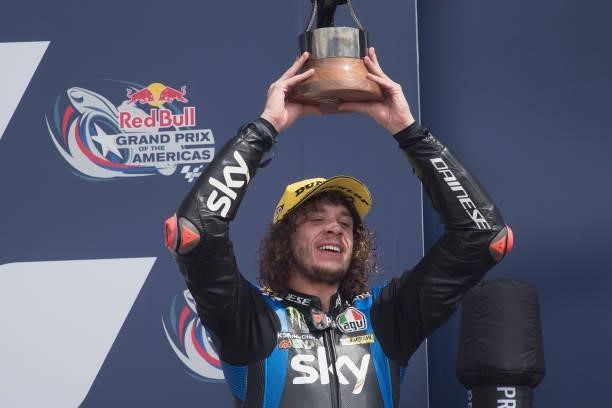 Marco Bezzecchi of Italy and Sky Racing Team VR46 celebrates the third place on the podium during the Moto2 race during the MotoGP Of The Americas -...
