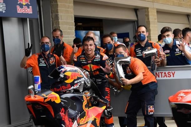 Raul Fernandez of Spain and Red Bull KTM Ajo celebrates the victory with team the podium during the Moto2 race during the MotoGP Of The Americas -...