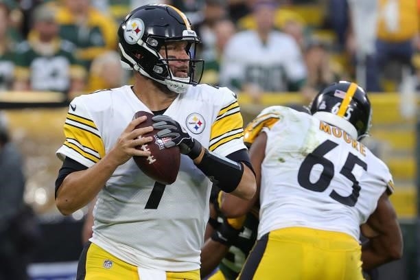 Ben Roethlisberger of the Pittsburgh Steelers drops back to pass during a game against the Green Bay Packers at Lambeau Field on October 03, 2021 in...