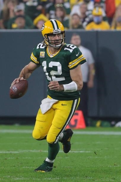Aaron Rodgers of the Green Bay Packers looks to pass during a game against the Pittsburgh Steelers at Lambeau Field on October 03, 2021 in Green Bay,...