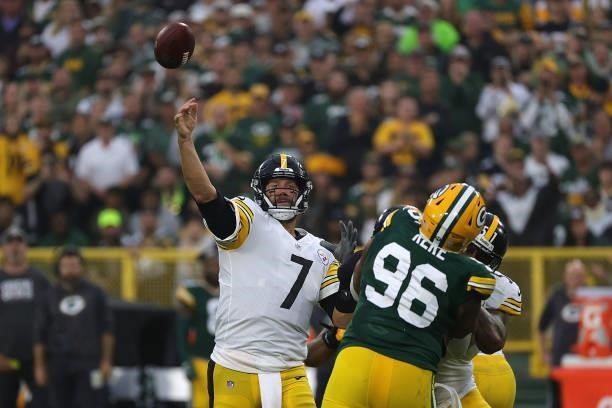 Ben Roethlisberger of the Pittsburgh Steelers looks to pass during a game against the Green Bay Packers at Lambeau Field on October 03, 2021 in Green...