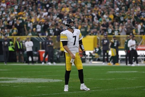 Ben Roethlisberger of the Pittsburgh Steelers looks to the scoreboard during a game against the Green Bay Packers at Lambeau Field on October 03,...