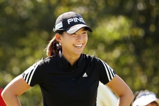 Hinako Shibuno of Japan smiles on the 4th tee during the final round of the 54th Japan Women's Open Golf Championship at Karasuyamajo Country Club on...